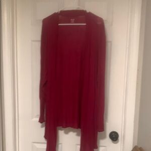 A lightweight, vibrant red , 3/4 length sleeves, top.